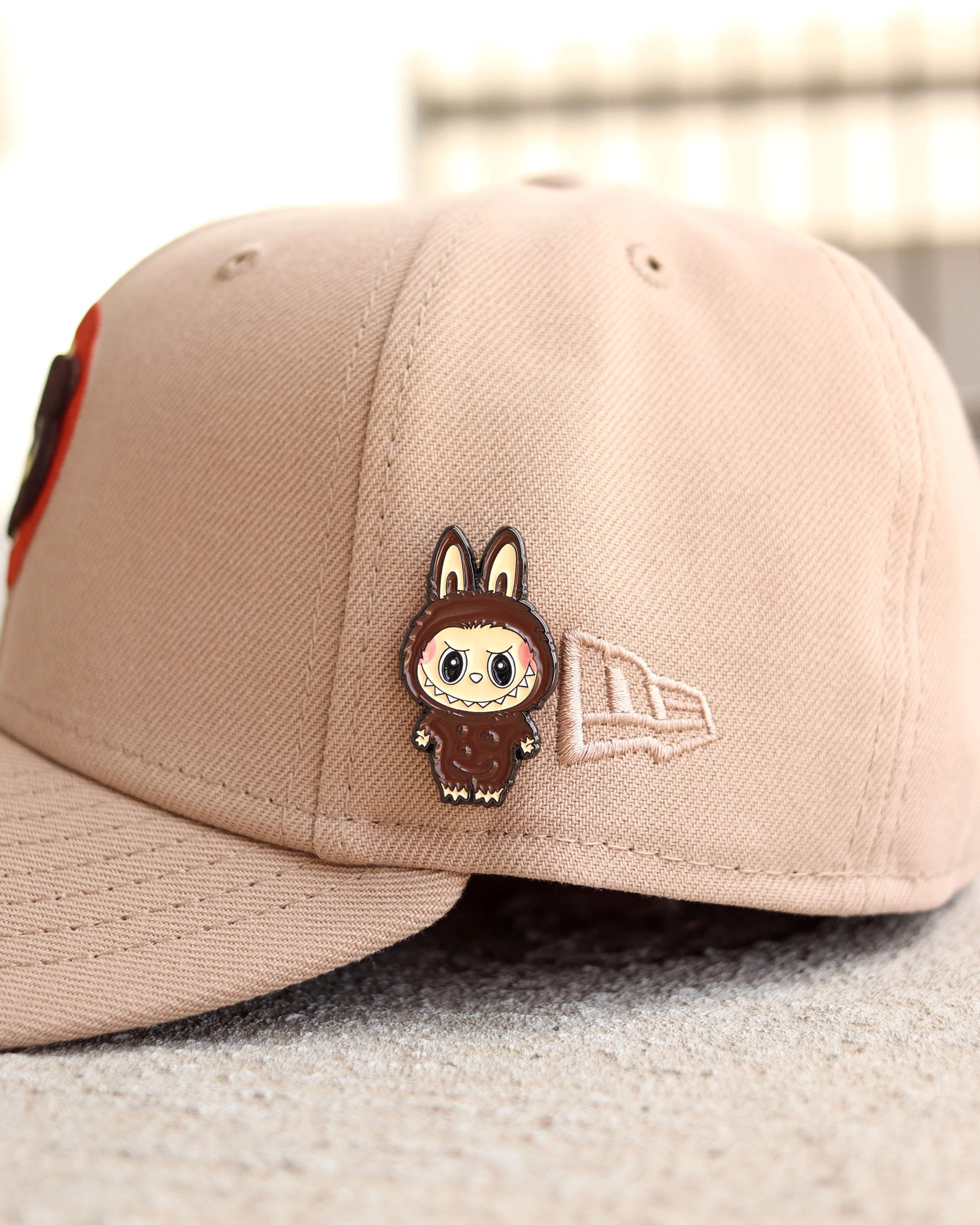 Brown labubu pin