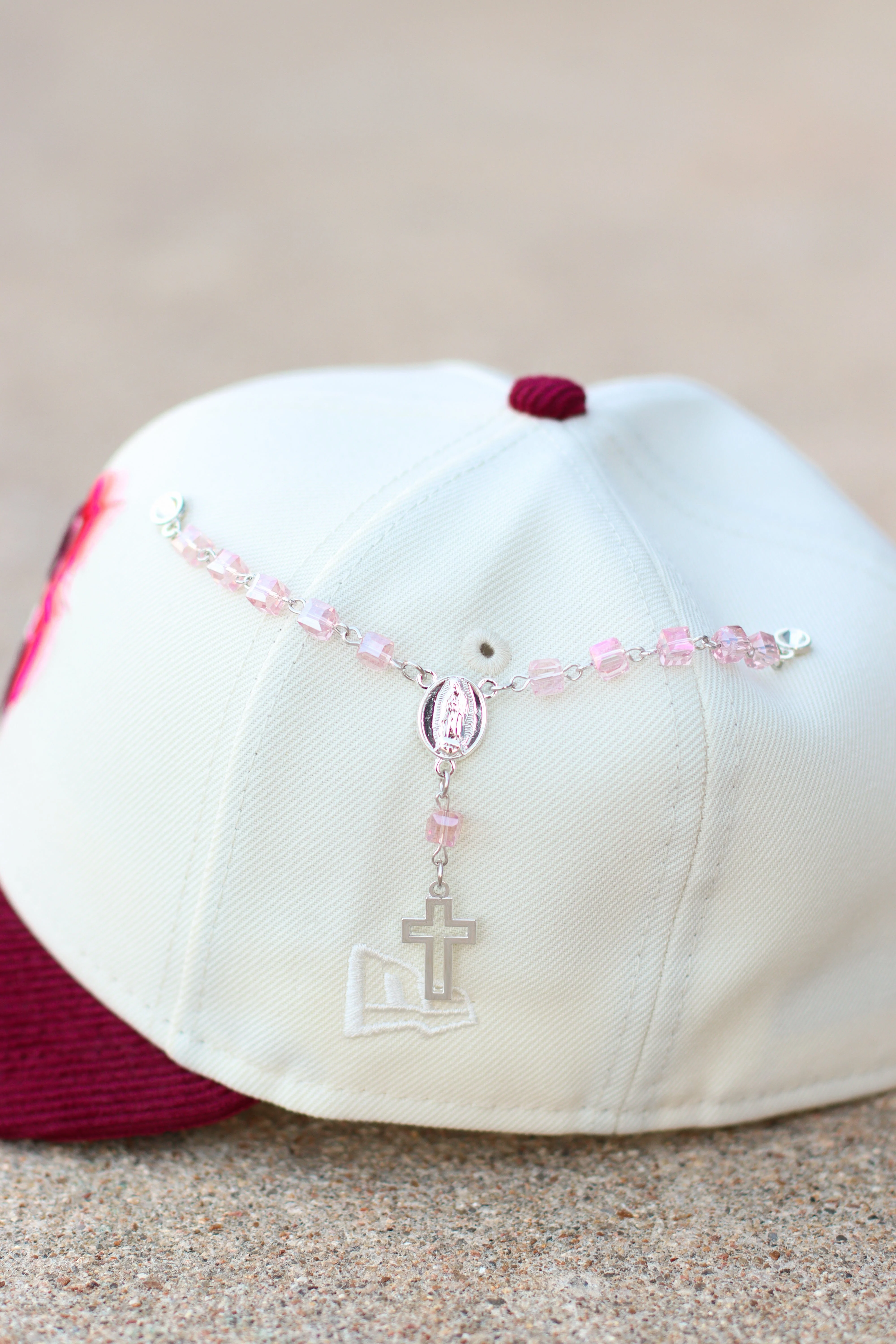 Pink rosary pin